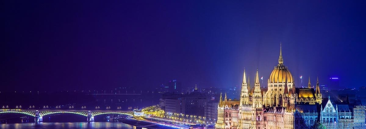 Beautiful image of the lit up Hungarian Parliament building and the river Danube